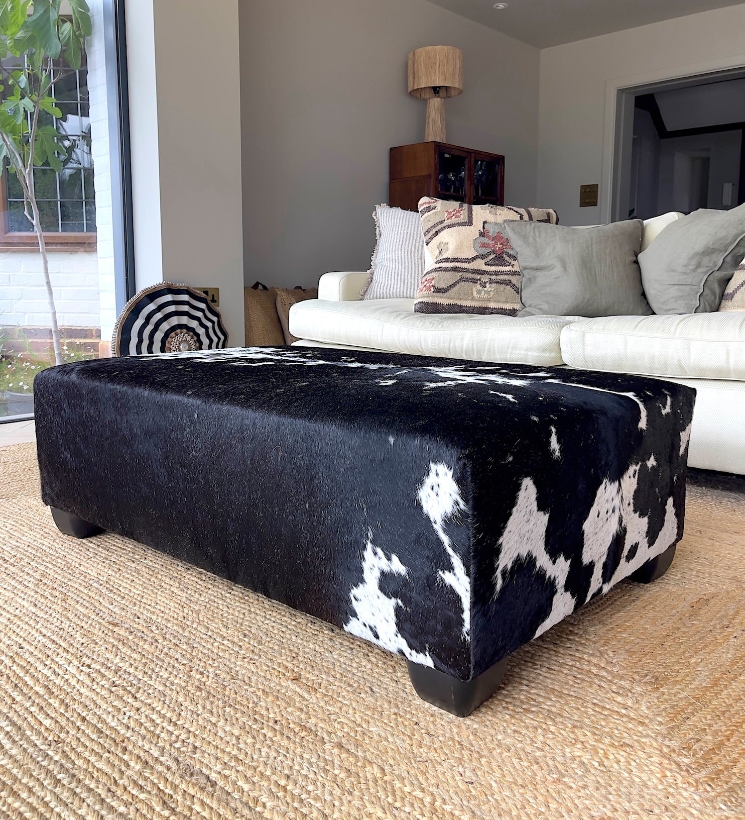 cowhide ottoman, cowhide footstool, bespoke furniture