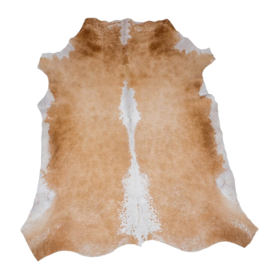 Caramel champagne cowhide rug with symmetrical markings