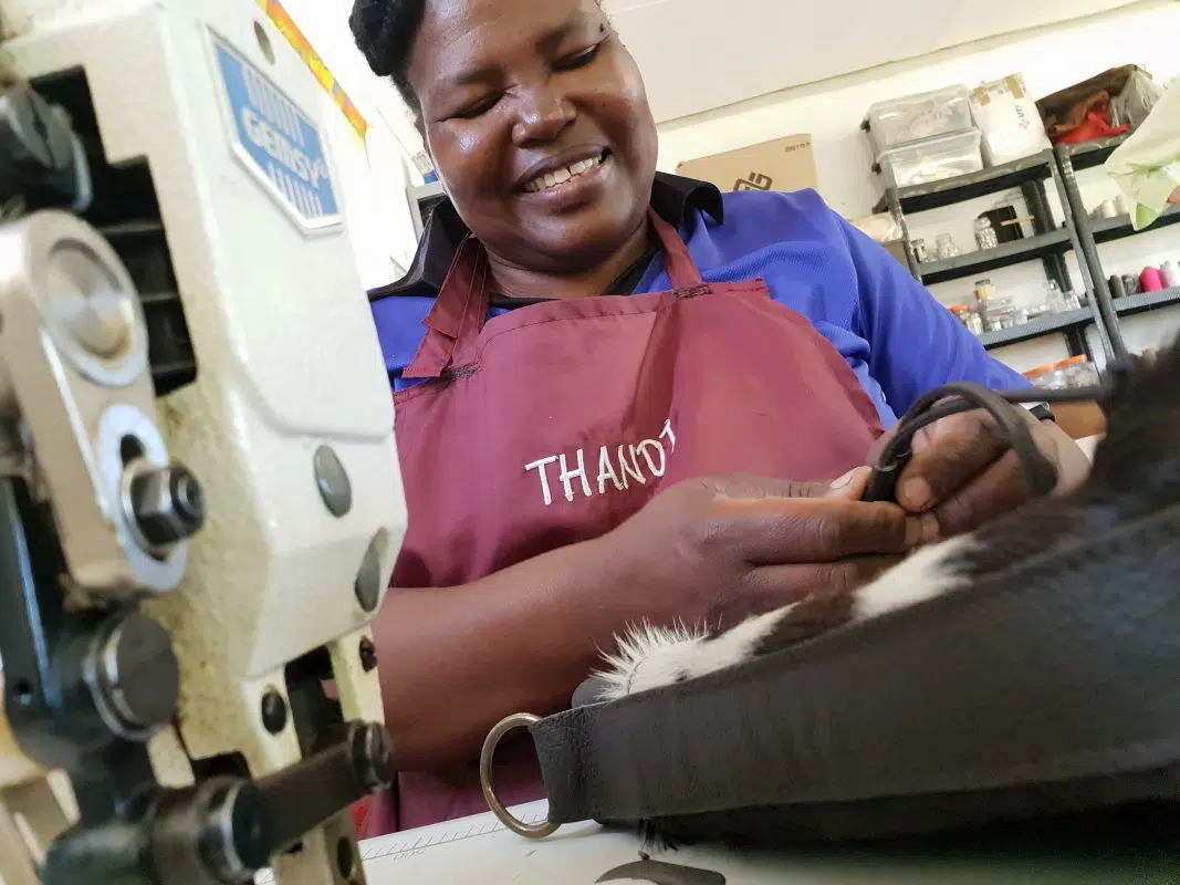Women working on our handmade cowhide ethical products