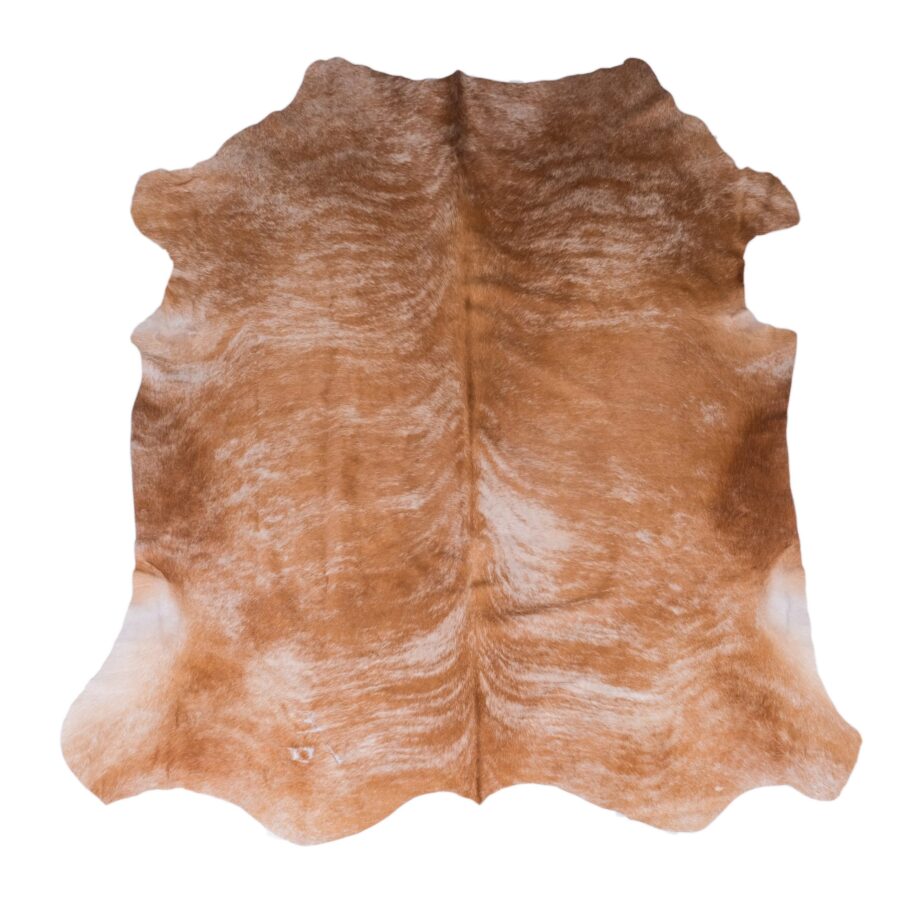 rusty brown cowhide rug, cream interiors, cowhides, skins, interiors, sustainable decor, interiors ideas, living room style, ethically sourced decor