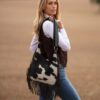 Boho fringe bag by Zulucow – cowhide shoulder bag with western and festival vibes