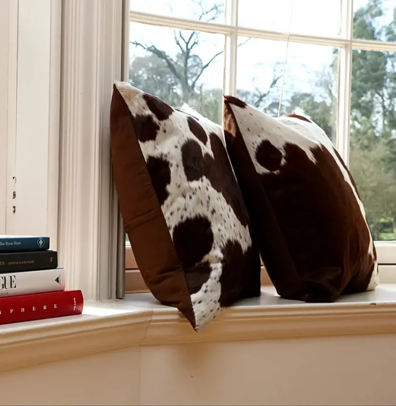 cowhide cushion, cowhide interiors, sustainable homeware, ethical decor, autumn home styling 