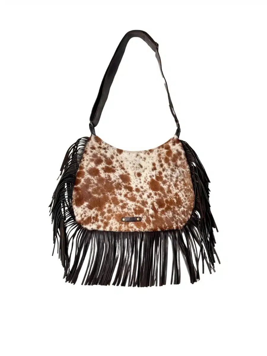 Cow print cowhide fringe bag – western style, handmade, and empowering Zulu artisans. western style