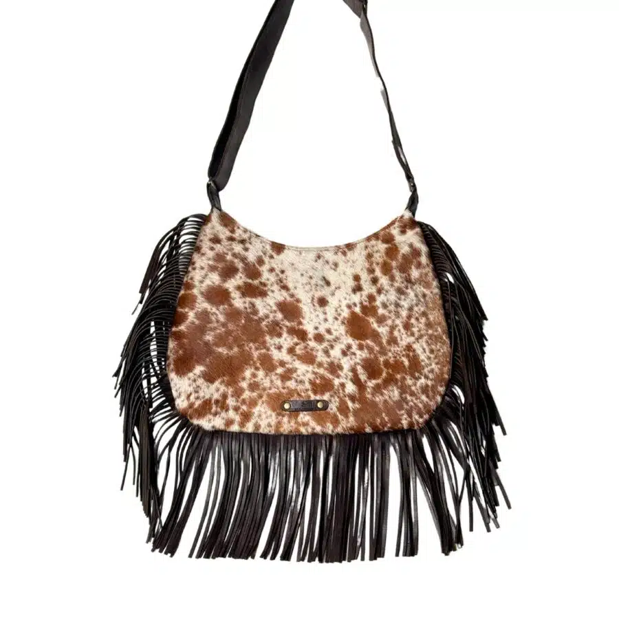 Cow print cowhide fringe bag – western style, handmade, and empowering Zulu artisans. western style