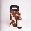 cowhide and leather wine bottle carrier, sustainable gifts, gifts for men.