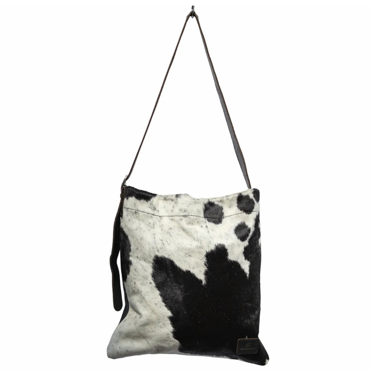 The 'Helen' cowhide messenger bag in black and white