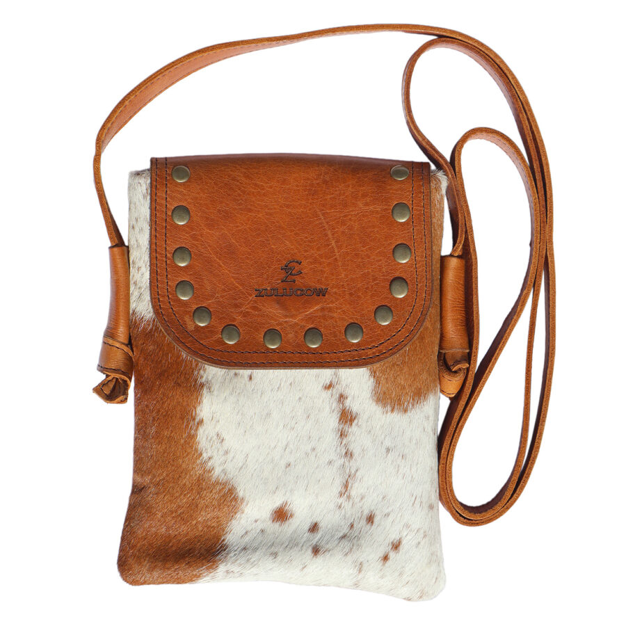 Boho mini cowhide phone bag made from genuine leather with western-inspired fringe and a compact design, perfect for festivals or everyday essentials