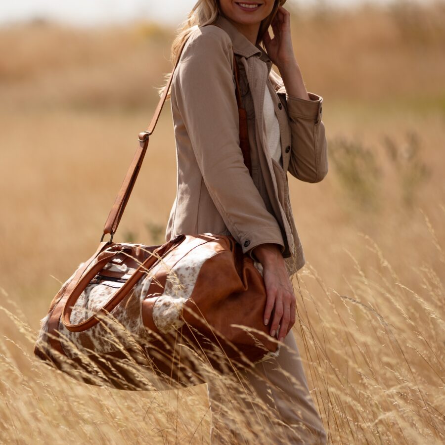 Hand-made, leather and cowhide travel bag, or duffel bag, for weekends away