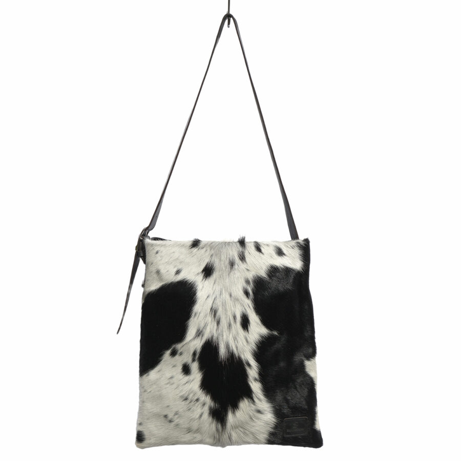 Brown Cowhide Messenger Bag, in a chestnut cow print, with a crossbody strap and yellow velvet lining.