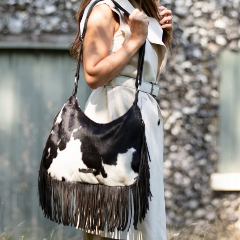 Black and white cowhide fringe bag