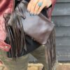 leather back of a cowhide western purse